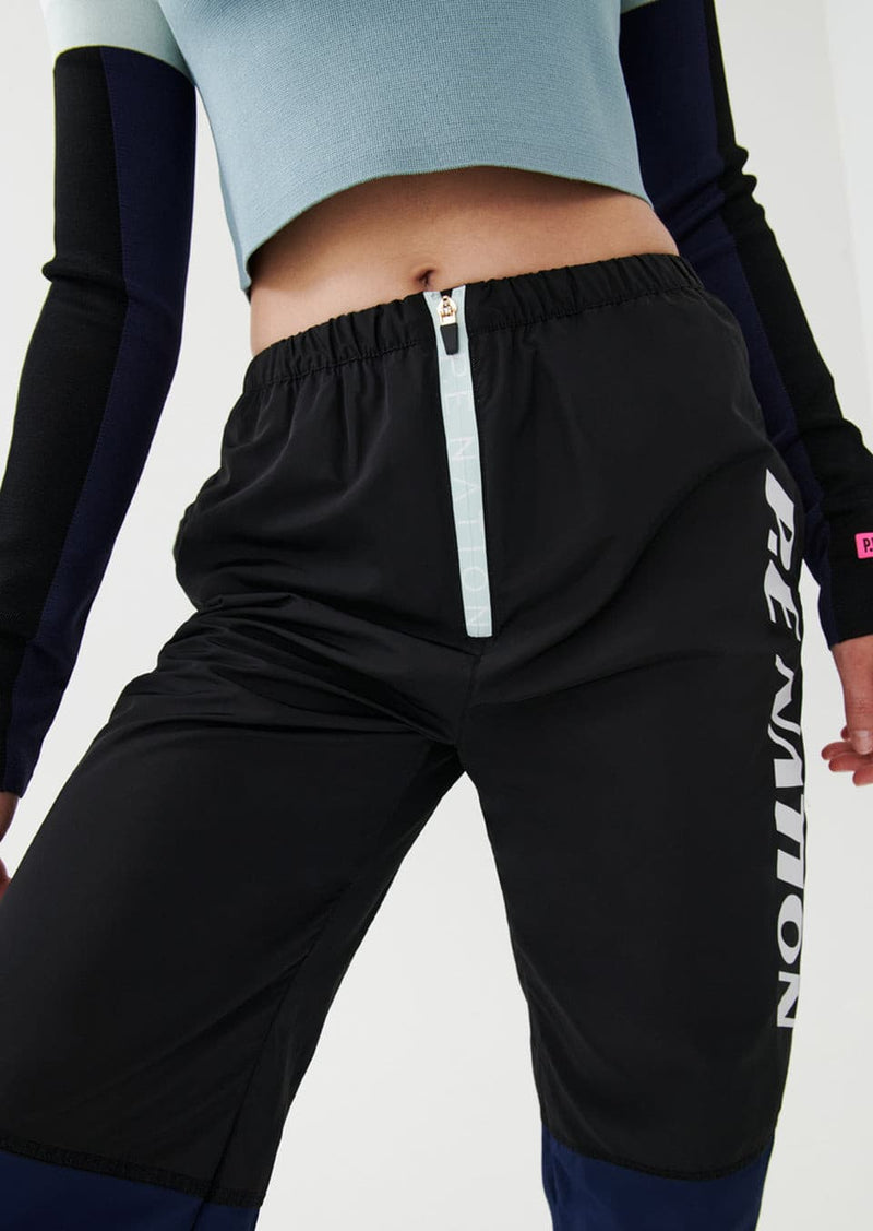 HIGH DIVE TRACK PANT IN BLUE.